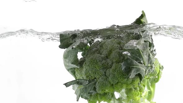 Broccoli Cabbage Falling Into Water