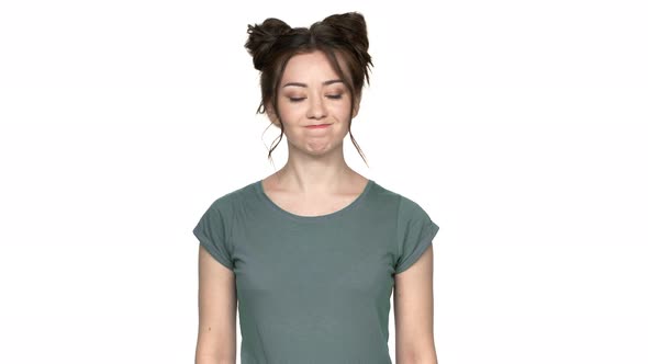 Portrait of Serious Woman 20s with Double Buns Hairstyle Shaking Head in Denial and Expressing