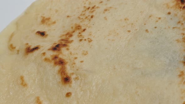 Slow tilt over pancake texture after being fried close-up  4K 2160p 30fps UltraHD footage - Tasty co
