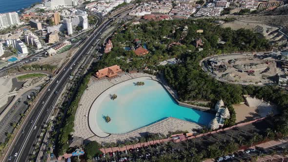 Drone over the highway in Costa Adeje and water park, Tenerife, Canary Islands