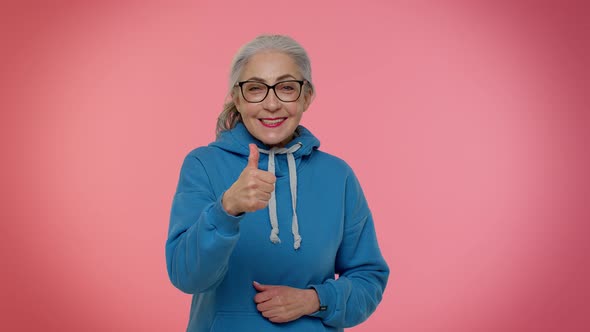 Senior Old Granny Woman Raises Thumbs Up Agrees with Something or Gives Positive Reply Likes Good