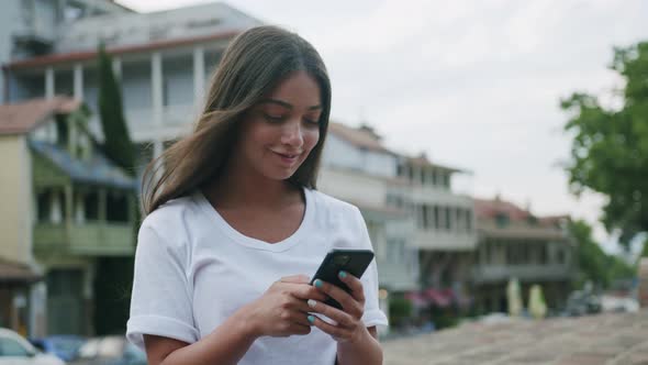 Young Woman Using Smartphone