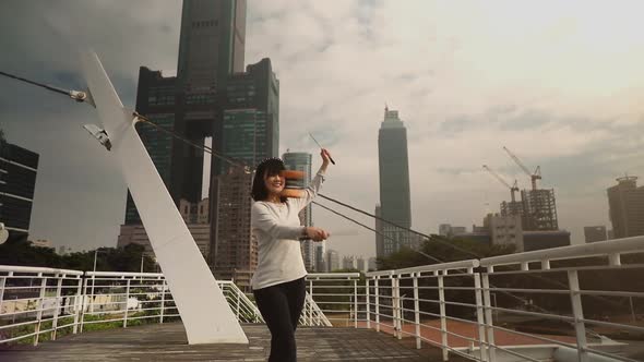 Taiwanese woman playing with a Chinese Yo-Yo