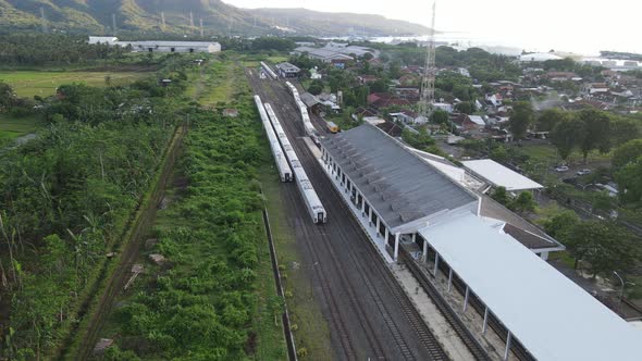 Aerial view of train stasiun with ferry port background in Banyuwangi, Indonesia