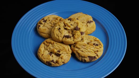 Cinematic, Rotating Shot of Cookies on a Plate 