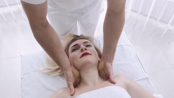 Woman Gets Shoulder Massage Spa By Therapist