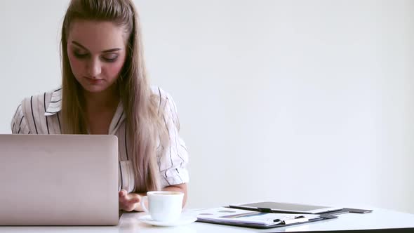 Blonde Business Woman Working at Modern Office