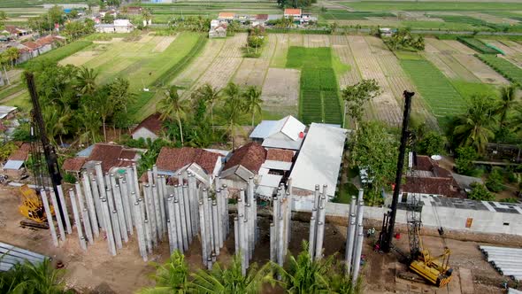 Monorail construction site drilling bore pile foundation, Java, Indonesia, aerial