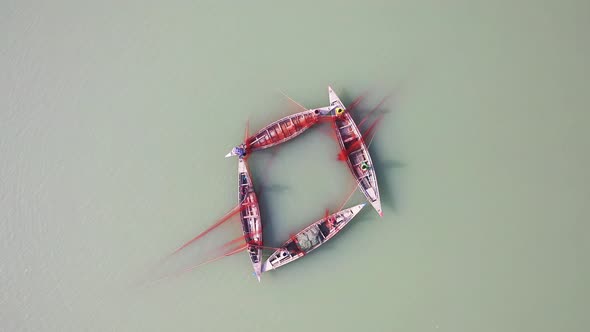 Aerial view of traditional canoe used for fishing in Bengali river, Bangladesh.