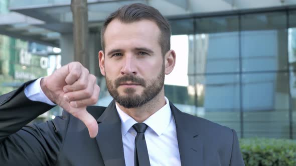 Thumbs Down By Beard Businessman Outside Office