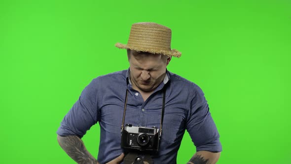 Portrait of Man Tourist Photographer Having Stomach Ache. Chroma Key