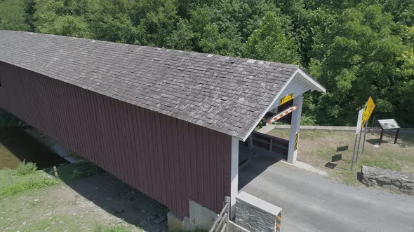 Aerial View of a Covered Bridge in Amish Countryside