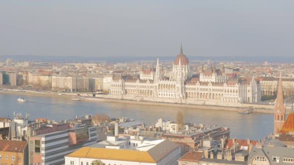 Parliament building panning  on Danube river bank 4K 2160p UltraHD footage - Budapest Hungarian capi