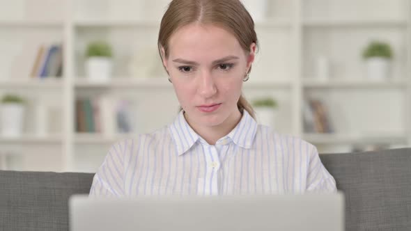 Portrait of Positive Young Woman with Laptop Smiling 