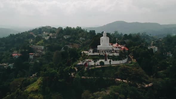 Aerial of Big White Buddha statue in Kandy. Bahirawakanda Vihara Buddha Statue, Kandy, Sri lanka