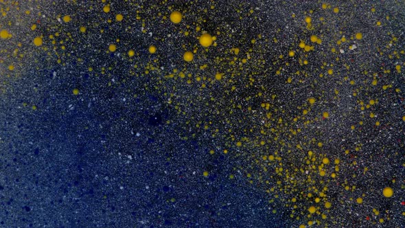 Rounded Yellow Particles on a Bluewhite Background with Sequins