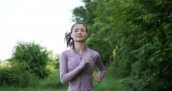 Asian young woman running