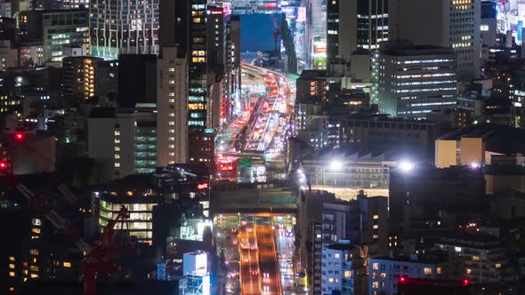 time lapse of the Metropolitan Expressway no.3 Shibuya Line and city at night in Tokyo, Japan