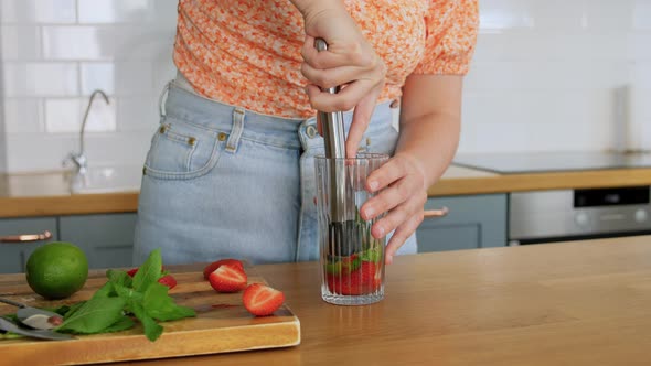 Woman Making Cocktail Drinks at Home Kitchen