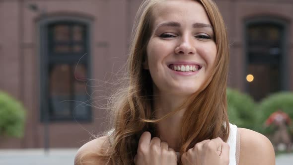 Flying Hairs in Wind of Beautiful young Girl, Outdoor