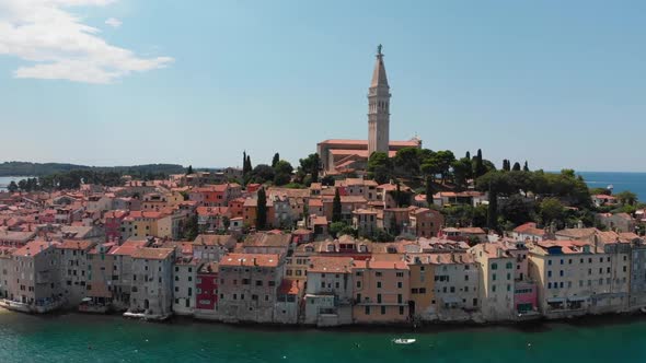 Aerial shot of the old town Rovinj (Croatia), whose houses are densely crowded on the water.