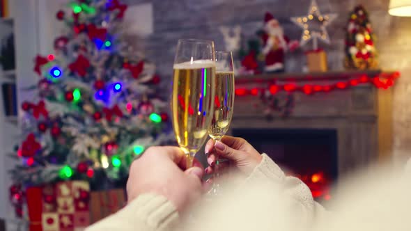 Close Up of Sparkling Champagne Hold By Couple