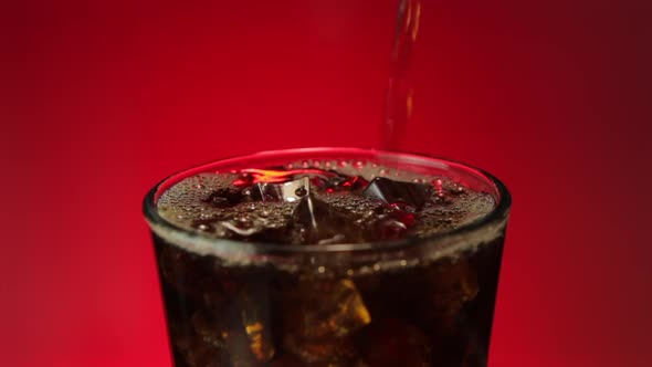 Refreshing Cola Soda Splashing In Ice