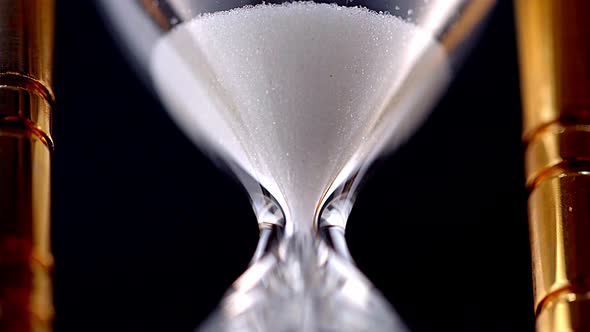 Golden hourglass on a macro shot