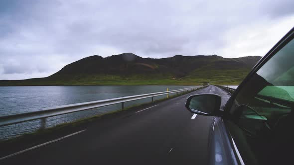 Woman Tourist Travel By SUV Car in Iceland