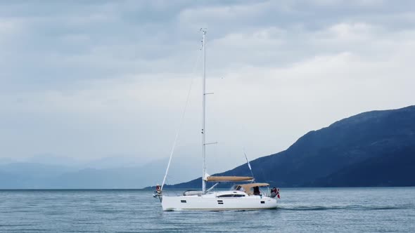 The Yacht Sails Through Norway on the Picturesque Sea