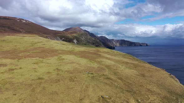 Aerial View of the Beautiful Coast at Malin Beg with Slieve League in the Background in County