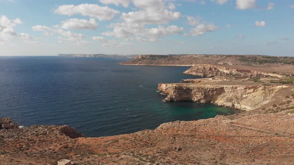 Aerial drone video from northern Malta near the Ghajn Znuber Tower.