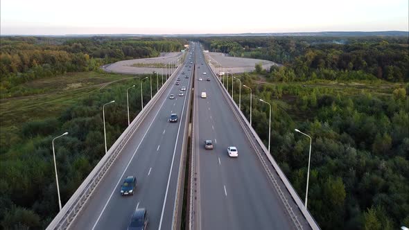 Aerial Photography of the Road Bridge Highway Cars Driving on the Road Shooting From a Height