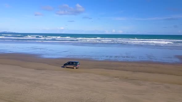 Aerial footage of driving on the beach