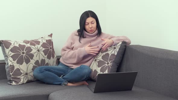 Caucasian woman video calling on laptop computer, streaming online webinar training