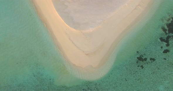 Aerial drone view of a scenic tropical island in the Maldives
