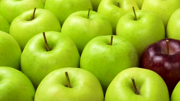 Many apples at wooden plate