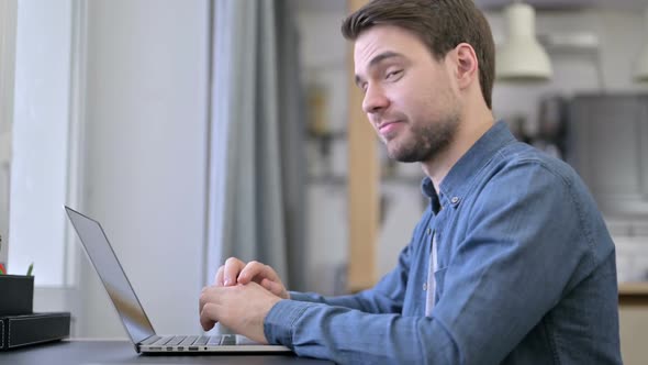 Beard Young Man Showing Thumbs Up in Office