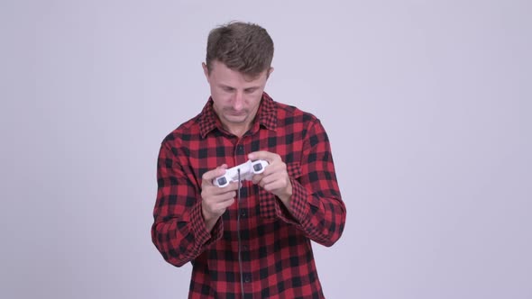 Tired Bearded Hipster Man Feeling Sleepy While Playing Games