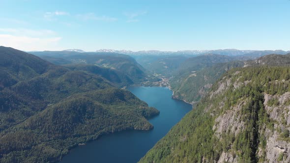 Aerial: beautiful Bandak lake in Norway summer, Dalen village in background