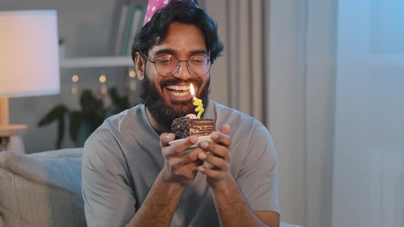 Portrait Happy Cheerful Arabian Indian Bearded Man in Glasses in Festive Cap at Home Evening