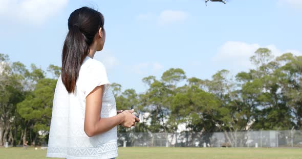 Woman control flying drone