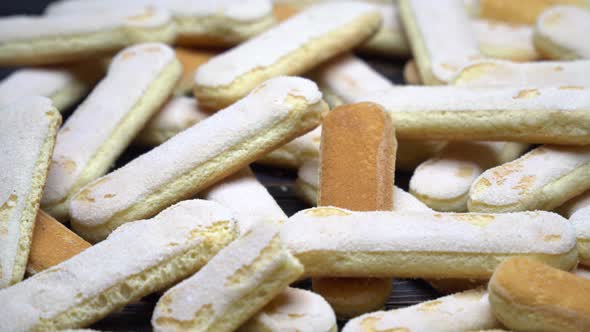 Italian Savoiardi Ladyfingers Biscuits on Wooden Background