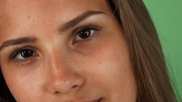 Attractive Young Woman Smiling Joyfully To the Camera