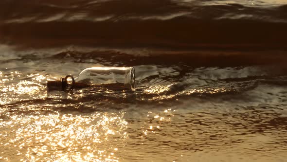 Message in the Bottle Against the Sun Setting Down