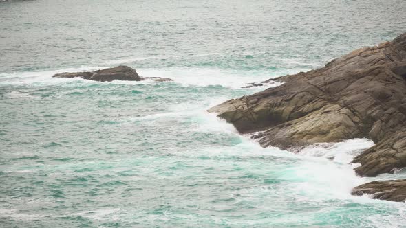 Sea Waves Break on The Stone Shore