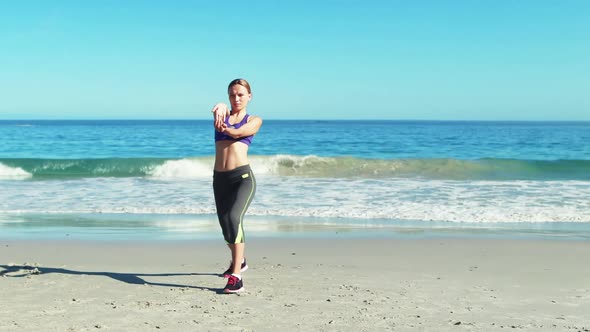 Woman performing stretching exercise