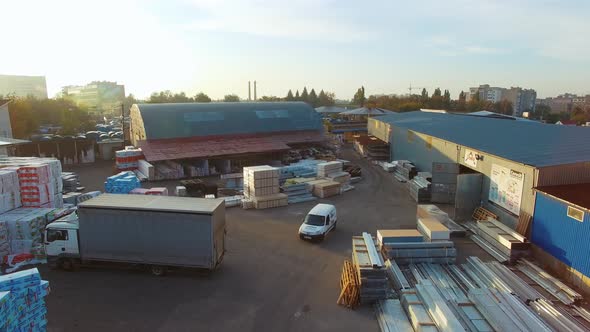 Logistics center from above. Aerial view of large modern warehouse