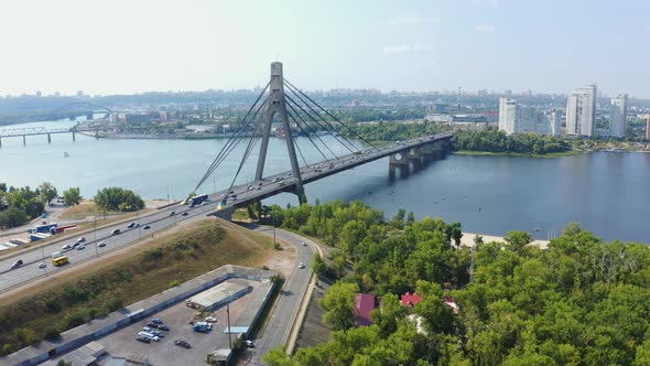 Aerial Fly Over Northern Bridge Moskovsky in Kiev at Summer. View From Above