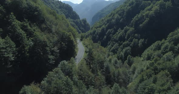 Cyclists on mountain road, Italian Alps, Italy